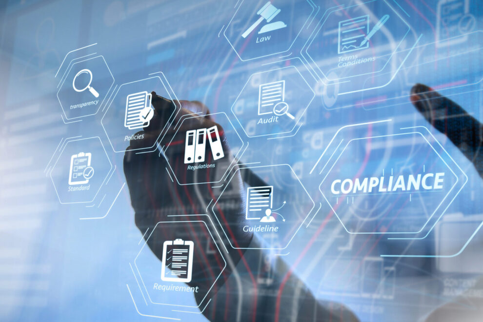 Compliance Virtual Diagram for regulations, law, standards, requirements and audit.co working team meeting concept,businessman using smart phone and digital tablet and laptop computer in modern office